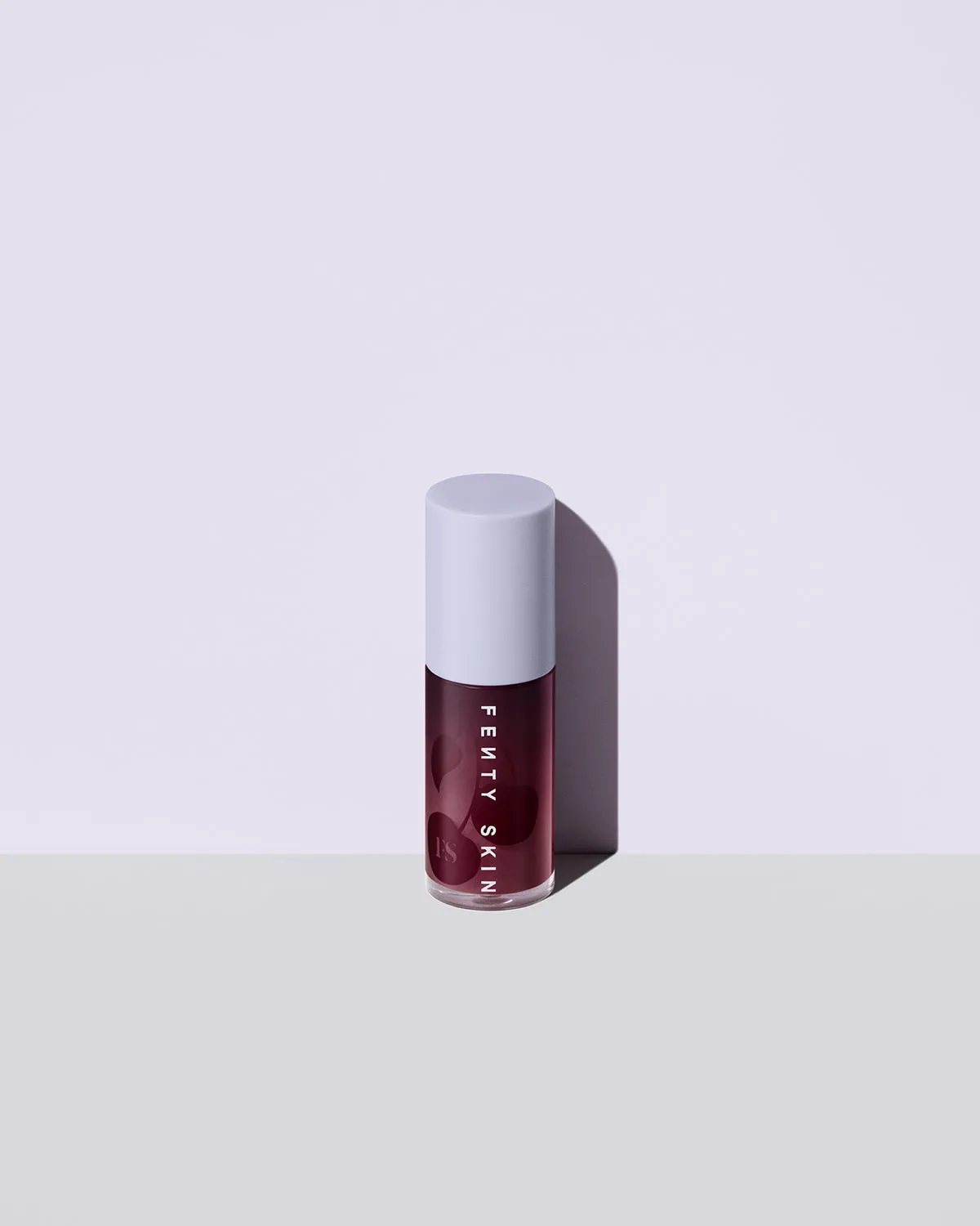 Fenty Treatz Hydrating   Strengthening Lip Oil — Black Cherry