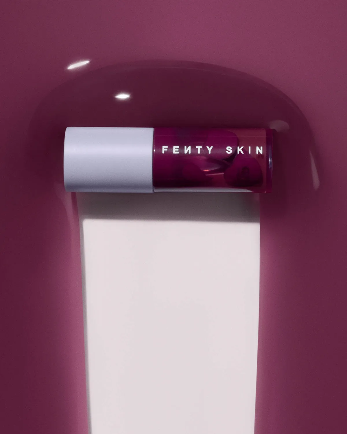 Fenty Treatz Hydrating   Strengthening Lip Oil — Black Cherry